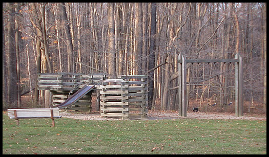 Playground (and playing field) by tennis courts